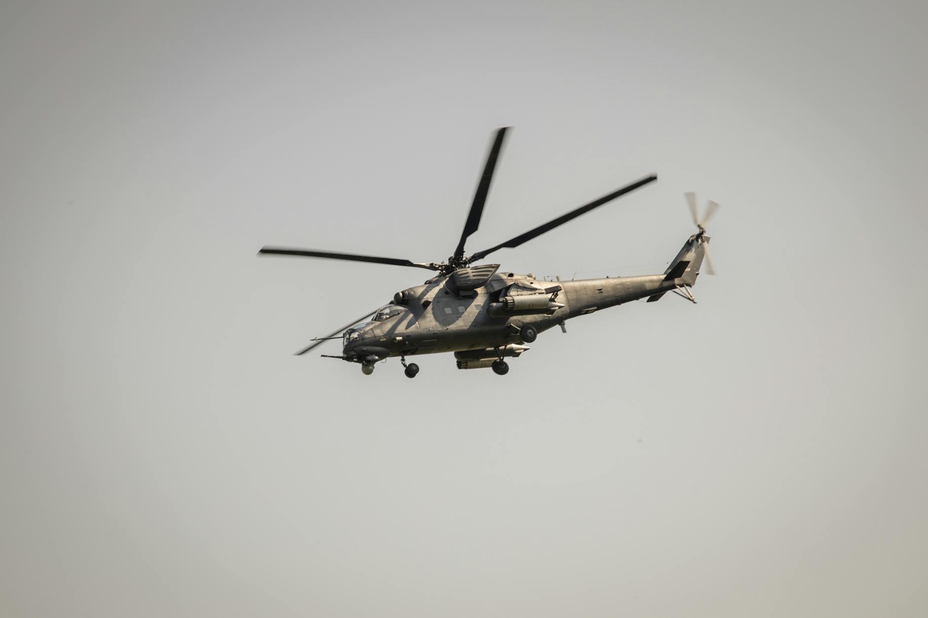 A military attack helicopter flying in the sky over Belgrade, Serbia.