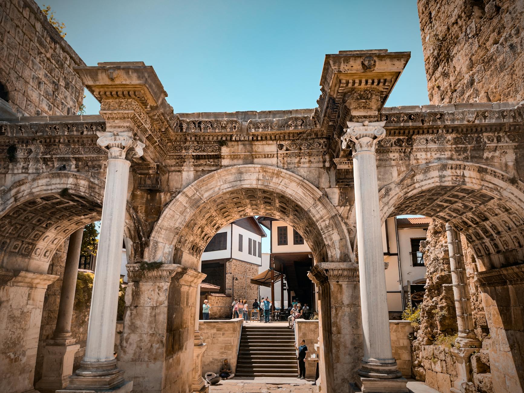 Majestic view of Hadrian's Gate, an ancient Roman gateway in Antalya, Türkiye.