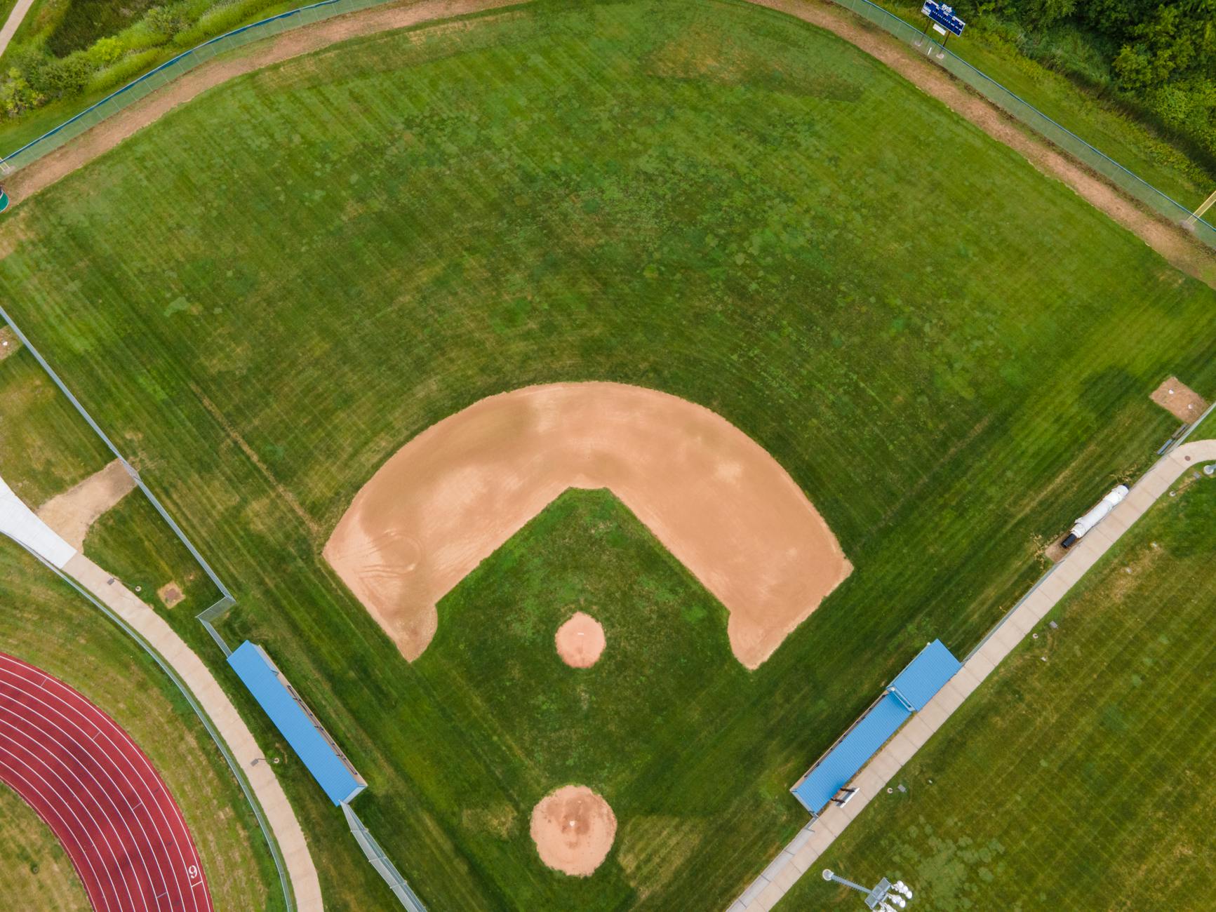 Drone shot of a baseball field with lush green grass in Menomonie, WI.